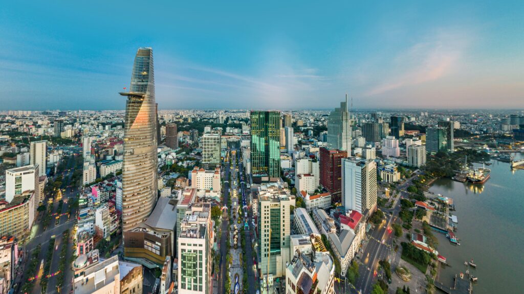 Aerial view of Ho Chi Minh City skyline with Bitexco Financial Tower and Saigon River